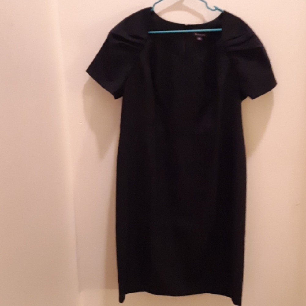 Black,  never worn, quality midi dress